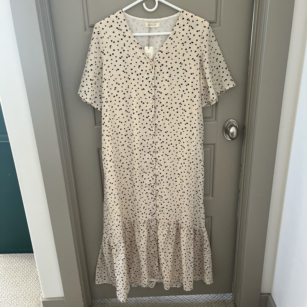 such a cute pattern and fabric and just overall the dress is so cute.